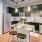 a kitchen with a table and stools