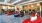 a room with red couches and a rug