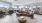 a living room with a couch and chairs