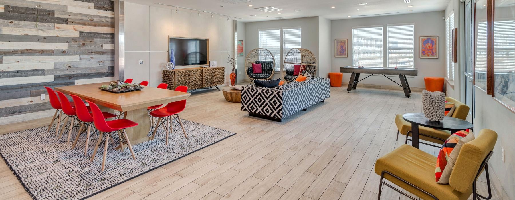 a living room with a fireplace and a table