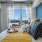 a bed with a large window